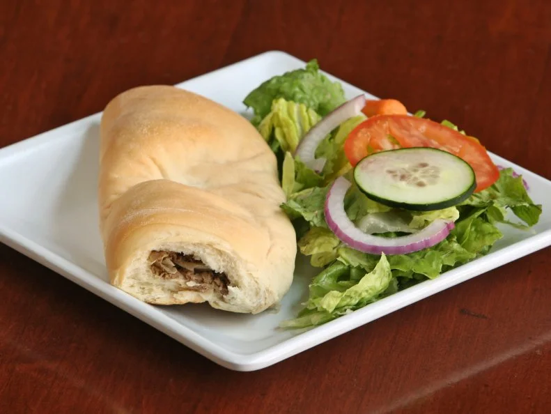 A true Nebraska original via a specific group of immigrants â  Germans who emigrated from Russia â   the bierock is a meat pocket loved statewide. Traditionally, the soft, just-sweet bread is filled with a mixture of cabbage, onions and ground beef; cheese is often in there, too. Theyâ  ve been made famous under another name, runza, and are served in the Midwest thanks to a restaurant chain of the same name, as well as during Nebraska Cornhusker football games in Lincoln. But find a locally made version in McCook, where Sehnertâ  s Bakery serves their own version with a crustier exterior and heartily seasoned beef inside.