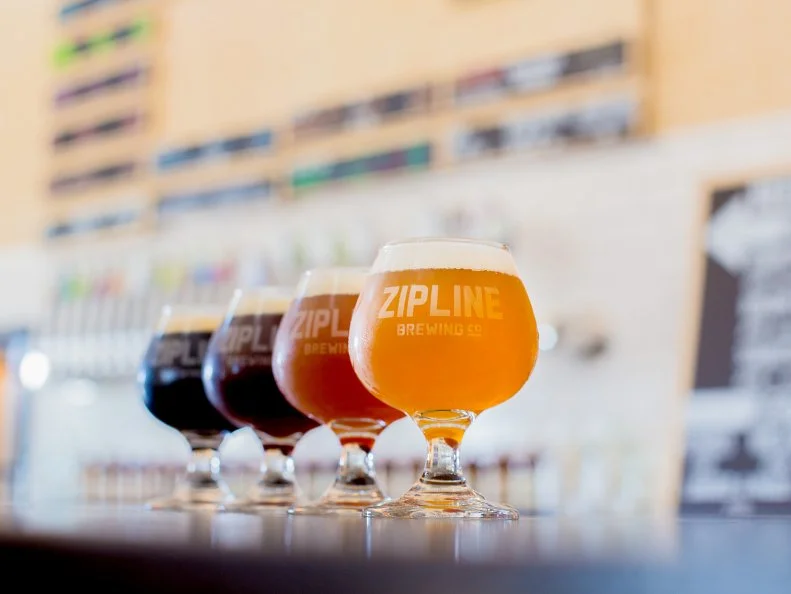 Breweries have bloomed all over Nebraska, and plenty of them are taking advantage of local, seasonal ingredients. Take Ord’s Scratchtown Brewery, where the beer is made in ultra-small batches and some seasonals never make it out of town. The list changes all the time, but you’ll find some of their larger batches on tap in Omaha at Local, a beer hall with several locations. Lincoln’s Zipline Brewing operates a beer hall in Lincoln and a tasting room in Omaha. Their IRA, a mix of hoppy India Pale Ale blended with malty red ale, is a local favorite.