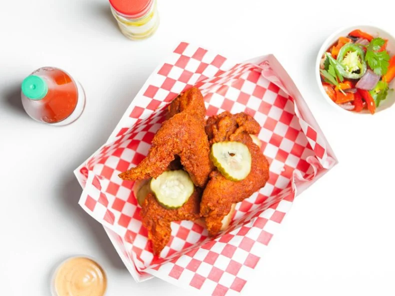 Howlinâ   Rayâ  s brings devilishly spicy chicken to the City of Angels. The high level of heat hasn't deterred lines of fans who'll regularly queue for two hours to grab the finger-staining, tongue-sizzling chicken. Chef Johnny Zone, who co-owns the restaurant with his wife, fell for hot chicken during time working at Husk in Nashville. Zone sources top-quality, hormone-free chicken to serve in a variety of pieces â   including a quarter, half, whole bird or boneless breast â   spiced Mild, Medium, Hot, X-Hot and Howlin! and served by themselves, on waffles each weekend and in a sandwich. Dampen the fire with macaroni salad and peach iced tea.