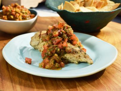 Sunny Anderson prepares an Italian-style salsa, as seen on Food Network's The Kitchen.
