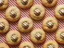 Sugar, Heavy Cream, Rum Extract, Ground Cloves, Egg, Foil Wrapped Striped Milk chocolate - White Chocolate Drops