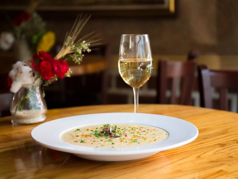 Though versions of it can be traced to Scottish settlers in the South as early as the 1700s, today’s Charleston she crab soup is said to have been created by Mayor Goodwyn Rhett’s butler at the John Rutledge House during one of several visits by President William Howard Taft. Versions of it are found today at restaurants throughout Charleston, but many long-time residents swear by the version ladled out at the historic 82 Queen. There’s lots of butter and cream involved, but it’s the crab roe, crab meat, fish stock, sherry and whipped sherry cream that give this dish nearly holy status in the Holy City.