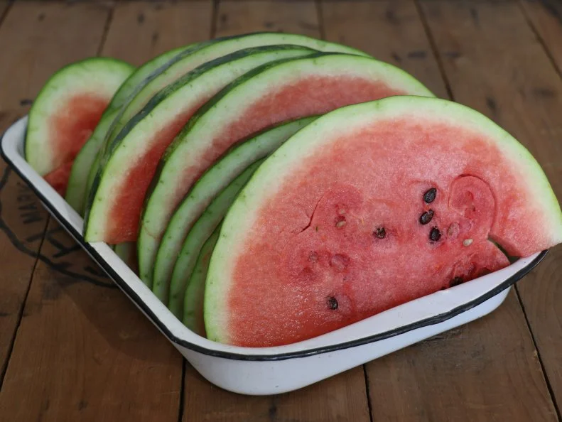 Jam-packed with vitamins A and C, watermelon is suitably named as it contains 92 percent water and six percent sugar. The dot-on-the-map community of Forestburg near the James River declared itself South Dakota’s watermelon capital for good reason: hot summer days and cool nights create the ideal watermelon-producing conditions. Additionally, the glacier-deposited sandy soil on top of clay in the river valley helps yield a sweetness found only in watermelon grown in this area. Shane Baysinger of Shane’s Melons took the helm of his grandfather’s operation and he now sells melons in South Dakota, Minnesota and Iowa.
