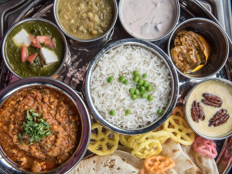 Blending traditional Indian cuisine with Southern touches, Chauhan Ale & Masala House embraces its Nashville roots. Chef Maneet Chauhan, a judge on Chopped, seamlessly marries her two cultures in dishes like a black-eyed pea tikki burger and an Indian “meat and three,” which puts a meat dish alongside three vegetable sides. Chauhan has its own signature beers —including a fragrant Saffron IPA — thanks to its own brewery, Mantra Artisan Ales; the cocktails also incorporate Indian spices and herbs. The brick-walled space is romantic, too, with low lighting and colorful lanterns hanging throughout the space.