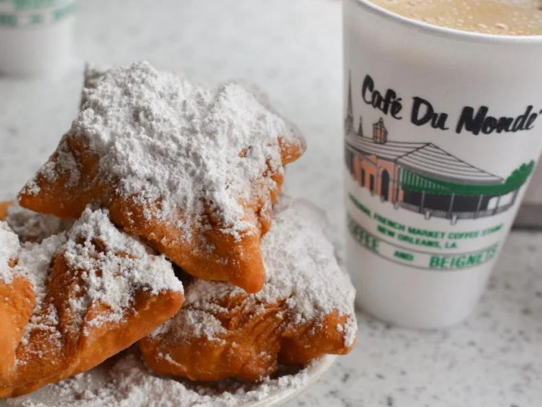 Louisianaâ  s deeply entrenched French influence gives it a cultural edge over many other states, especially when it comes to food. A prime example: beignets. Long before doughnuts became a trendy food, NOLA residents were tucking into powdered sugar-dusted pillowy rounds of fresh-out-of-the-fryer beignets 24 hours a day at legendary coffee shop CafÃ© du Monde. The iconic French Quarter spot is globally renowned for its puffy rounds of fried dough, perfect for dunking in the shopâ  s chicory-scented coffee.
