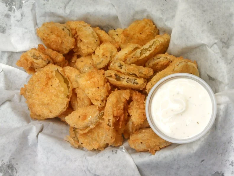 Deep-fried pickles may have become a popular snack food from coast to coast, but this Mississippi cafe is thought to have invented the dish, attracting crowds for its fried dills since the 1970s. Named for its original location in Hollywood, Mississippi, this sweet diner fries rounds of dill pickles in beer batter with a touch of cayenne pepper and chile powder. Though only 2,000 people live in Robinsonville, the café serves nearly 100,000 pickles annually.