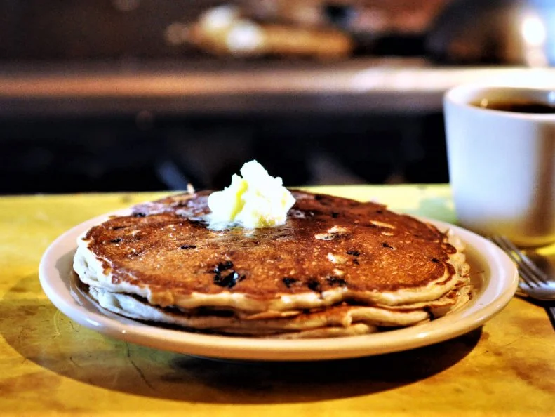 While northern Minnesota may be the land of blueberries, Alâ  s Breakfast, in Minneapolisâ   Dinkytown, is the land of, well, breakfast, at least in the Twin Cities. No visit here would be complete without a stop at Alâ  s, where the waitstaff is sassy, in that Minnesota-nice kind of way, and the pancakes are loaded with fresh blueberries and tons of crunchy walnuts. Yes, the food here is incredible, with highlights that include the famous â  The Joseâ   â   crispy hash browns topped with a mountain of melted cheddar, homemade salsa and a poached egg â   and the addictive waffles, and the atmosphere is lively. Be prepared for a wait, though, because Alâ  s counter seats only 14 people. The line to get in can be long, but the wait is worth it. Besides, you may make a few friends â   sharing body heat has a way of breaking the ice on a cold Minnesota morning.