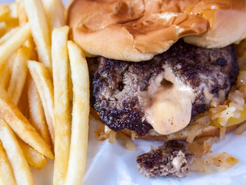 We Minnesotans can get uncharacteristically boastful when it comes to our burgers, and we should. Even President Obama paid a visit to Mattâ  s Bar, a no-frills joint that dates back to 1954 and lays claim to the Jucy Lucy, a burger with molten cheese stuffed inside the patties. In retro fashion, everything is served out of a basket here and your waiter will accept only cash.