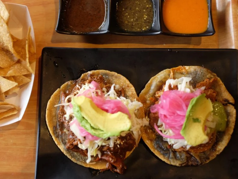 Sure, this spot is billed as a taqueria, but we suggest skipping the obvious pick of tacos. Instead, order a panucho or two. A delicacy of Yucatan, Mexico, this must-try menu item starts with a fried tortilla that’s sliced open and crammed with a black bean paste. Each panucho can be customized with your choice of protein, which is heaped tostada-style on the crisp disc of dough, then crowned with lettuce, cabbage, avocado and pickled red onion. For a true taste of the Yucatan, opt for the poc chuc or cochinita pibil, which are both pork specialties of the region. Two panuchos at $4.50 each make for a filling meal that goes easy on the wallet. Oh, and don’t sleep on the chips and three kinds of homemade salsa that are served on the side.