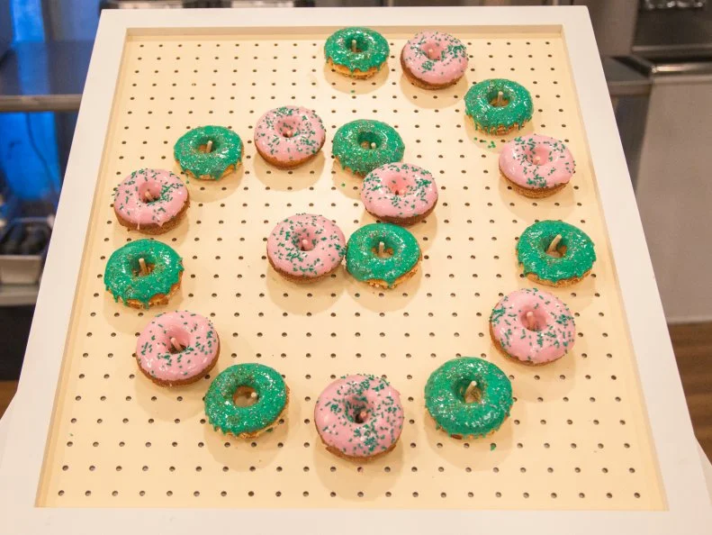 Abby's cinnamon donut w/ cream cheese glaze and Julia's key lime pie donut w/ lime glaze, as seen on Kids Baking Championship, Season 4.