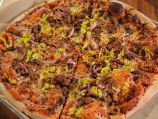<p>At Tutta&rsquo;s there&rsquo;s a pizza for every appetite but they&rsquo;re known for their smoked-meat topped creations. The Texan features smoked brisket topped with their house-made barbeque sauce, red onions, pepperoncini peppers and melted mozzarella cheese.</p>