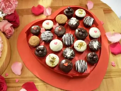 The Kitchen hosts Pass the Box of Chocolates Cake, as seen on Food Network's The Kitchen
