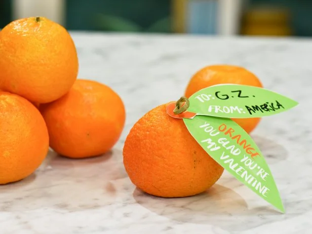 Jeff Mauro makes a Valentine's Day craft using oranges, as seen on Food Network's The Kitchen