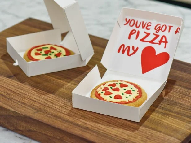 Katie Lee makes a Valentine's Day craft using cookies decorated like pizza, as seen on Food Network's The Kitchen