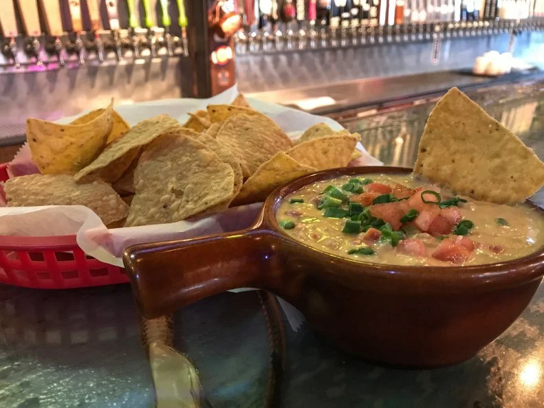 The name Velvet Elvis may not scream “Eat me,” but the Velveeta-and-Rotel-based dip served at El Bait Shop and High Life Lounge is an area favorite, named for the 50’s paintings of Elvis on black velvet. The dip also pays homage to the state’s history of pork and corn production; the Velveeta and tomato-and-green-chiles mix features spicy-sweet breakfast sausage and a side of corn tortilla chips. First-timers often order a second round, it’s so enjoyable; it’s particularly popular as a late-night snack, particularly if you’ve sampled one too many of El Bait’s 200-plus craft beers on draft.