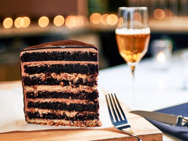 As any Chicagoan will attest, beer is the city’s drink of choice, so it makes sense that a standout cake can be found in a brewery, of all places. Each layer of the one crafted by Moody Tongue pastry chef Shannon Morrison is richer than the next. It starts with a pretzel, cereal and graham cracker crust, followed by espresso cheesecake, chocolate cake, a toasted caramel and pecan caramel filling and cocoa buttercream. They all repeat until there are a dozen rows, then the showstopper gets a finishing chocolate mirror glaze.
