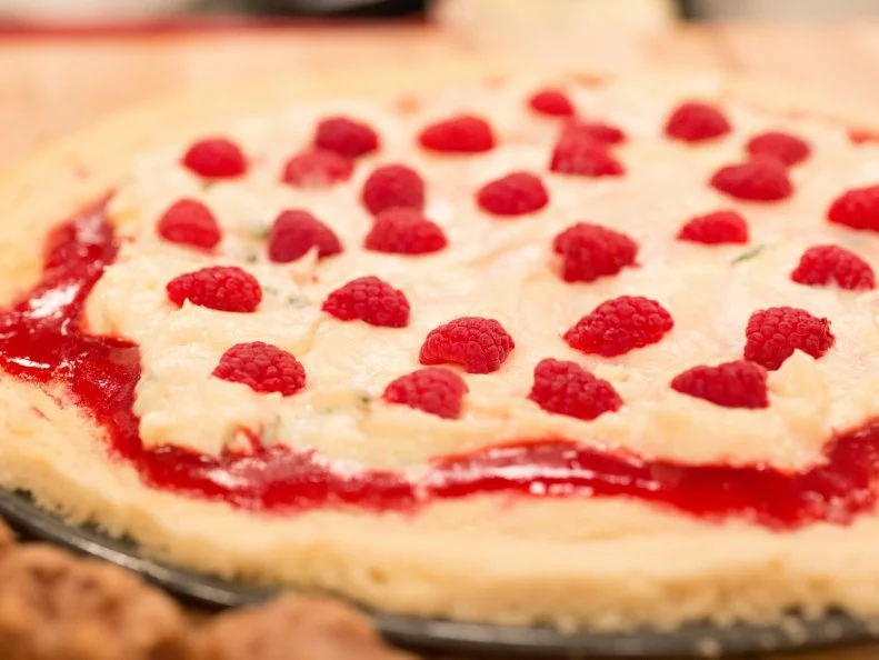 Grady's shortbread pizza w/ raspberry coulis and basil cream cheese frosting and cinnamon bread sticks, as seen on Kids Baking Championship, Season 4.
