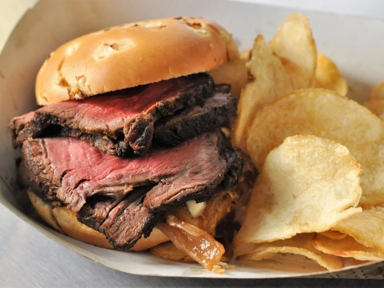 A long way from a stadium dog, this beef tenderloin sandwich at Ike’s Carving (sections 119 and 329) features meat that’s expertly carved to order, topped with creamy horseradish sauce and sandwiched in a fresh onion bun, made locally by the famous Denny’s 5th Avenue Bakery. Although it may feel more steakhouse than stadium, it won’t make you miss a play, and is easy to eat at your seat. For those at home, here Ree’s take on tenderloin sandwiches to try at home.