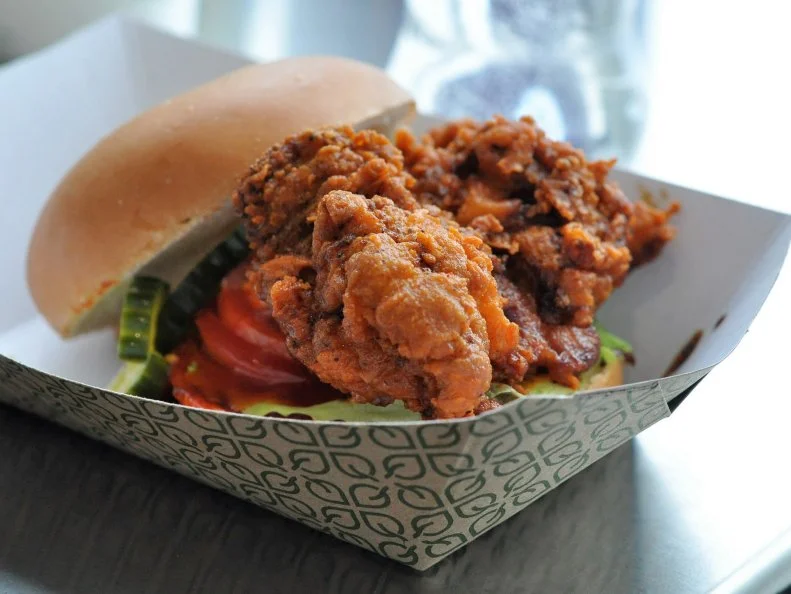 If you’ve spent any time eating in the Twin Cities, you will surely be familiar with Revival, a TC favorite, featuring some of the best fried chicken outside the South. So it should come as no surprise that they were tapped to open in the spanking new USB stadium (section 111), and that the food they’re serving is really good. Everything on the menu is worth eating, including plates of fried chicken and the original chicken sandwich, but if you’re looking to spice up your life and get blood pumping on a chilly day, opt for the Tennessee Hot Fried Chicken. This predictably messy sandwich will certainly light up your life, at least through the fourth quarter. Those who live in Nashville can run grab their own, but everyone else should prep Jeff Mauro’s fiery take.
