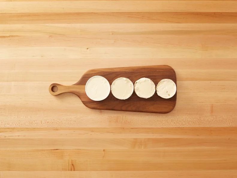 Cutting a Pint of Ice Cream - Macaron Ice Cream Sandwich: Cutting a pint of ice cream into disks and then stacking them in between macarons to create Macaron Ice Cream Sandwiches for Eatertainment, as seen on Kids Baking Championship, Season 2.