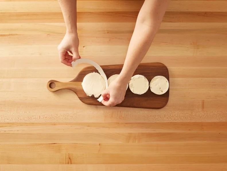 Cutting a Pint of Ice Cream - Macaron Ice Cream Sandwich: Cutting a pint of ice cream into disks and then stacking them in between macarons to create Macaron Ice Cream Sandwiches for Eatertainment, as seen on Kids Baking Championship, Season 2.