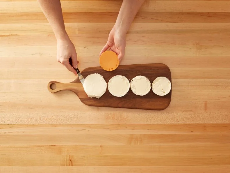Cutting a Pint of Ice Cream - Macaron Ice Cream Sandwich: Cutting a pint of ice cream into disks and then stacking them in between macarons to create Macaron Ice Cream Sandwiches for Eatertainment, as seen on Kids Baking Championship, Season 2.