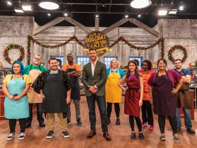 The contestants and host pose for a photo, as seen on Holiday Baking Championship, Season 5.