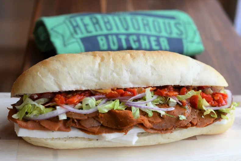The name says it all — this brother-and-sister-run business specializes in small-batch, plant-based meats. The siblings have crafted entirely animal-free alternatives to everything from sausage and jerky to roast beef and steak (also check out the line of nondairy cheeses, such as smoked Gouda, dill Havarti, ricotta and pepper Jack), available online or at their store or food truck. And there's no better showcase for their brilliant creations than the towering Italian Cold Cut sandwich, stacked with The Herbivorous Butcher's plant-based takes on mozzarella, pastrami, pepperoni and capicola ham.
