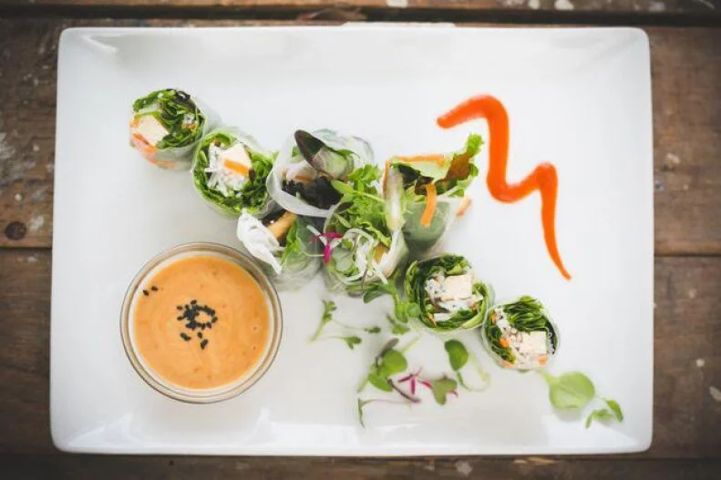 Asian flavors are culled from Vermont ingredients, at Burlington's first all-vegetarian restaurant. This unique mash-up results in goat cheese and fig wontons, with the wrappers folded around Vermont Creamery chevre; the Prik King stir-fry, featuring seasonal farm vegetables; and Vietnamese salad rolls, with bits of mango, herbs and lettuces tucked into rice paper.