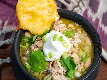 Katie Lee makes Green Chicken Chili with a Skull Garnish, as seen on Food Network's The Kitchen