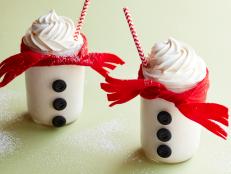 This snowman decoration comes together in a few minutes and makes a sweet way to serve a winter mocktail. The creamy white nog is dazzled with the wintry flavors of nutmeg and allspice.