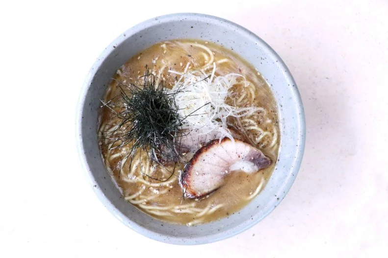 Yuji Ramen was once a pop-up but is now located at Okonomi. The menu offers three kinds of ramen and four kinds of mazeman (dry, brothless ramen), which is a riot of flavors and textures. One mazeman is the bacon and egg, with bacon, an onsen egg, mustard greens and bonito flakes. Taking a lighter, seafood-focused approach is the innovative Tunakotsu ramen, made from a tuna paitan broth with tuna belly chashu, leeks and spicy citrus yuzu kosho. The signature Okonomi Shoyu ramen is made from a fish broth with roasted ocean perch and collard greens.