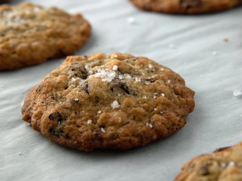 Close-up of Salty Oatmeal Chocolate Chunk Cookies, as seen on The Pioneer Woman: Back to the Basics, Season 15.