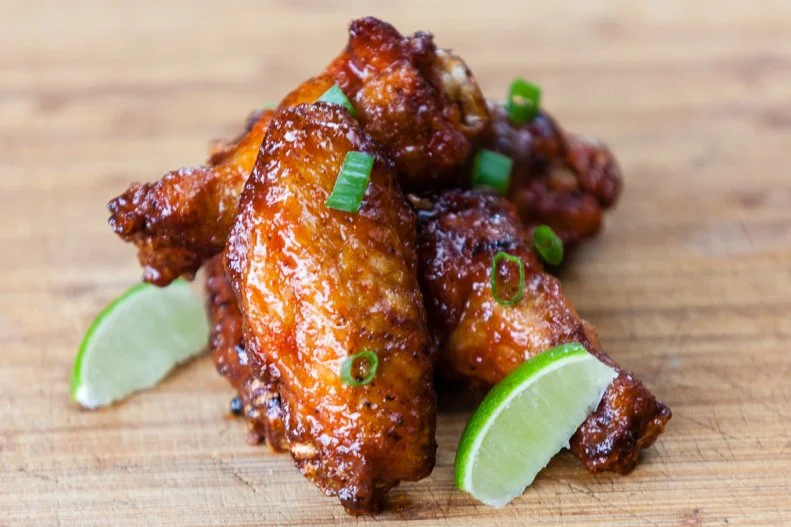 Wings are always a bonus at a barbecue spot, especially when they're cooked in the smoker. At this Atlanta joint, where Southern BBQ meets modern flavors, guests can enjoy their wings prepared in a  traditional style with BBQ or Buffalo sauce, or try one of the more creative sauces, like coconut lemongrass or Wu Tang.