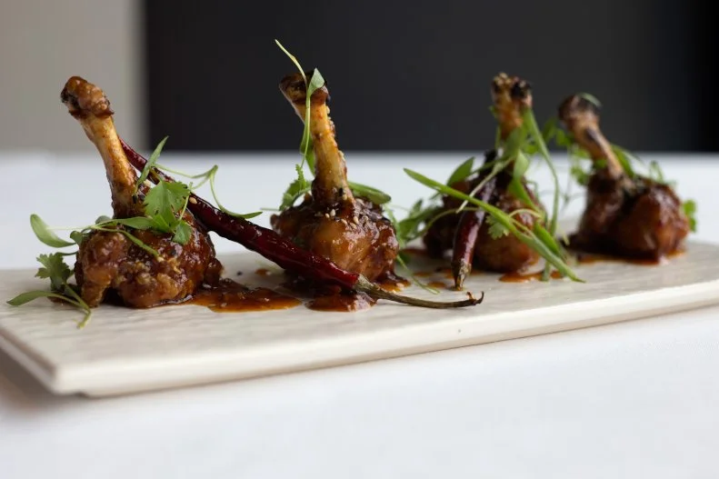 Everyone loves a secret, off-menu dish; here, it's these wings. The new Spago, fountainside at the Bellagio, offers countertop dining and a chance to try the juicy wings that are tossed in a sweet and spicy garlic sauce before they are dished out with cilantro and scallions.