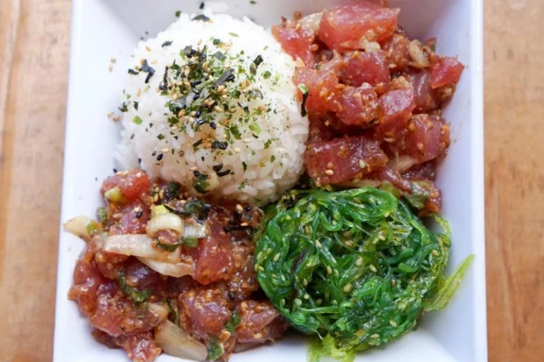 Poke may be found at hundreds of fast-casual joints spread across the mainland these days, but it originated in Hawaii, still the best spot on the planet to get a taste. This appropriately titled shack offers the freshest example of poke in the state. Fishermen will often walk up with the day's catch while customers wait in line for The Wet Hawaiian, fresh cubes of fish with a simple inamona (kukui nut) mix. In addition to its selection of poke plates, Da Poke Shack also offers cut-to-order sashimi to eat on-site and uncooked fillets to take home and enjoy later.