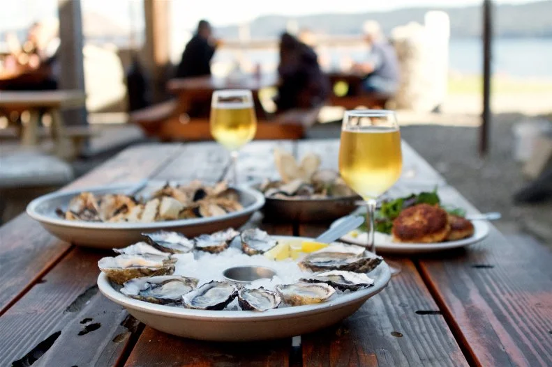 Opened in 2014 to give oyster lovers a place to eat Hama Hama's impeccable product, this saloon pays homage to the history of the laid-back, rustic oyster eateries common in the early 20th century. Rustic it most certainly is. The restaurant is completely outdoors — a bold move, considering it's located in a Pacific Northwest rainforest right near Olympic National Park — overlooking the oyster beds as well as the seals and eagles that hang out in the estuary. It's open year-round, so the folks here build bonfires and serve hot smoked-salmon chowder in the winter months and cover the deck with shade sails when the weather warms up. It may be exposed, but you can't find a better place to cozy up with a beer and a dozen oysters, some clams and killer crab cakes after a hike.