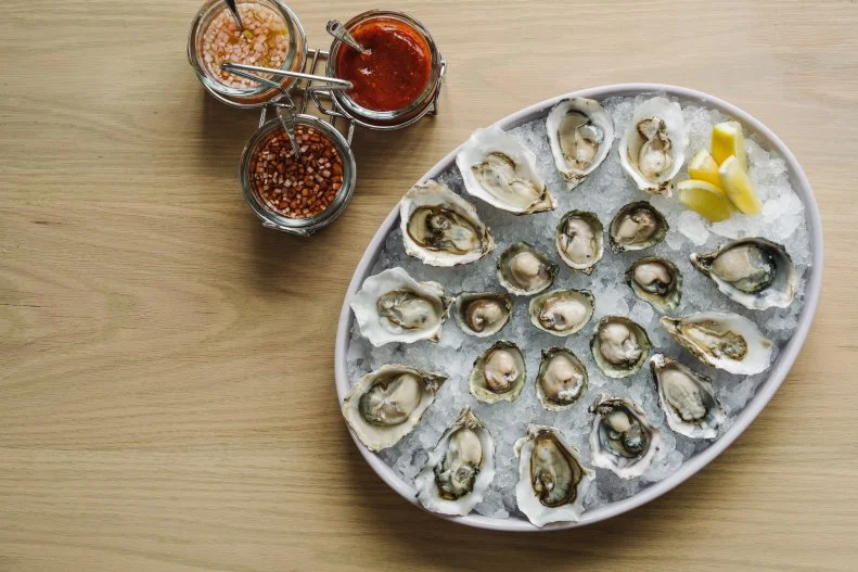 Chef Julia Sullivan's buzzy American restaurant is hailed for its seafood- and vegetable-centric small plates, many of which take a turn through the wood-burning oven. The food is simple, honoring the high-quality ingredients, and whimsical, offering fun riffs on classic seafood dishes rooted in contemporary seasonal cooking. What does that mean? Things like roasted oysters with green curry butter and lightly cured red snapper crudo with seasonally changing accoutrements like radishes, horseradish, tarragon and Cara Cara oranges. And the raw bar is hard to beat, generally featuring 12 to 16 varieties from all three coasts served with lemon, classic mignonette, watermelon mignonette and the house cocktail sauce.
