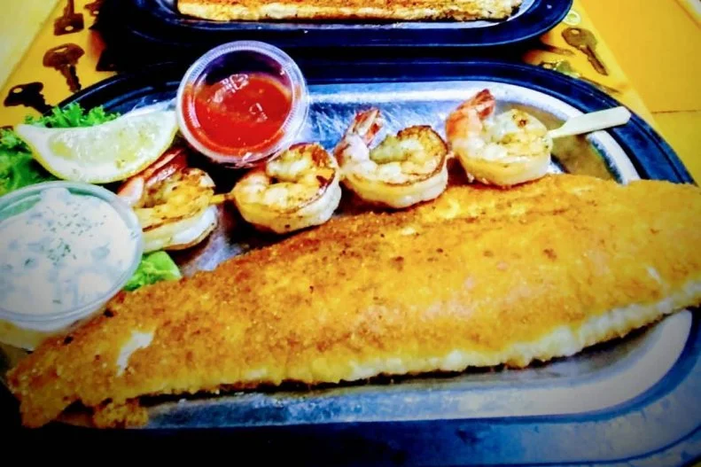 Mackinaw City is one of the top tourist destinations in the U.S. If you come to town and ask locals where to dine, chances are they'll suggest Keyhole Bar & Grill, one of the few eateries in town that stay open through the winter months. The nearly 50-year-old favorite specializes in freshwater fish from Northern Michigan. Its broiled whitefish is a top seller, available blackened for those who want a bit of spice. Parmesan-crusted walleye, rolled in cheese and seasoning and then seared, is both tender and crisp. Many guests choose to add golden-brown Great Lakes perch to their entrees for an extra charge. That well-prepared local fare has earned the laid-back restaurant countless accolades from local and national press.