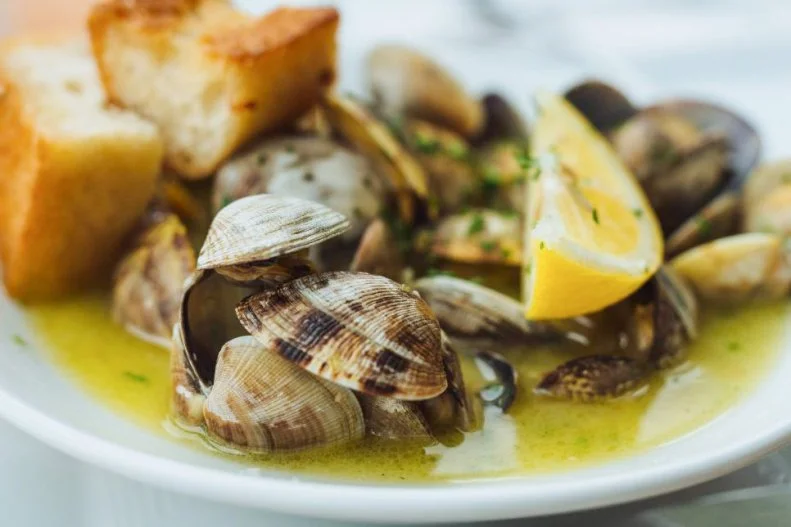 The frigid waters of the Pacific Northwest are home to some of the best seafood in the United States. The oysters are world-class, the Dungeness crab is excellent and the variety of clams available could make any bivalve lover drool with envy. It's all available fresh off the boat at Local Ocean Seafoods in Newport, a market and restaurant that gets most of its seafood from the fishing boats that pull into the harbor across the street. The place draws crowds seeking a taste of its roasted garlic and Dungeness crab soup, tomato-based fishwives' stew and bacon-wrapped tuna mignon, along with all the other delicious items on the menu.