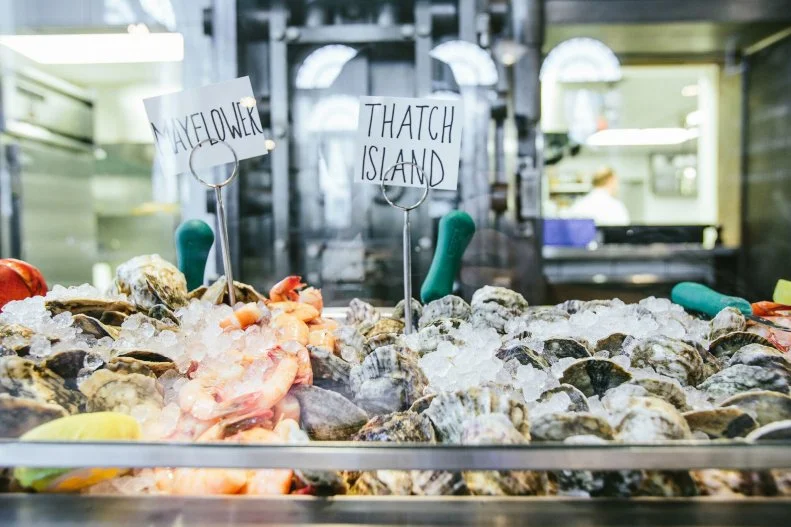 James Beard Award-winning chef Mike Lata's Southern seafood hall and oyster bar, The Ordinary, has a lot going for it. First off, it's housed in a bright and airy converted 1920s bank building (the kitchen is behind the doors to the vault). The seafood is some of the freshest in Charleston, and Lata strives to support local and regional fishermen. Their just-caught seafood is highlighted in the head-turning shellfish tower, blue-crab toast and crispy oyster sliders sandwiched between sweet Hawaiian rolls. It all adds up to make this buzzy spot â   which does get kind of loud â   one of the hottest restaurants and bars in this scorching-hot restaurant town.