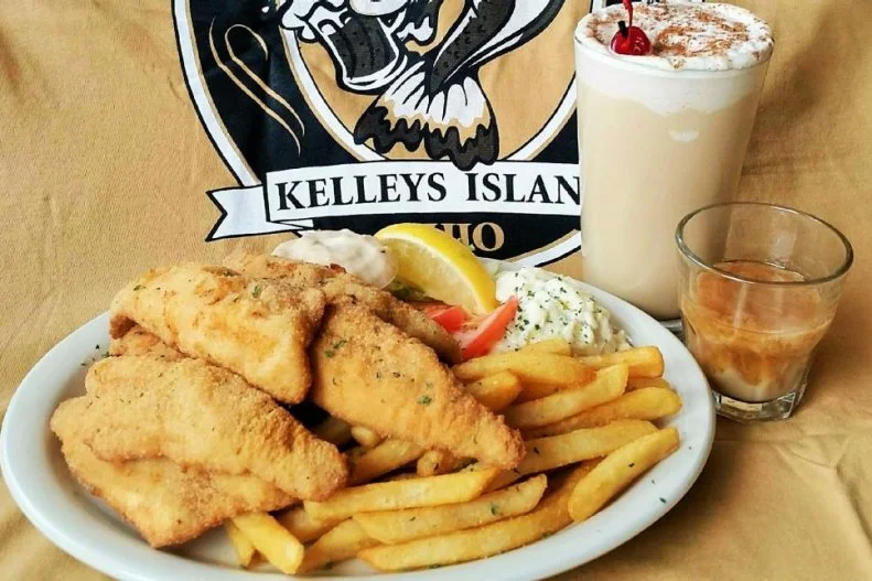 Taking advantage of Lake Erie's bounty of fish â   more are caught in its waters than in all the other Great Lakes combined â   this Kelleys Island watering hole serves around 3,000 diners on prime summer weekends. The circa 1969 dockside restaurant consistently ranks as one of the best seafood spots on the giant lake. Most Village Pump guests go for a "famous" Brandy Alexander, rich bowls of lobster chowder and freshly caught fried lake perch served in sandwiches, tacos and  dinner baskets with heaping piles of fries and coleslaw. If those popular dishes don't fit your fancy, you can choose from plenty of other aquatic dishes, like walleye bites, oysters, clams and shrimp.