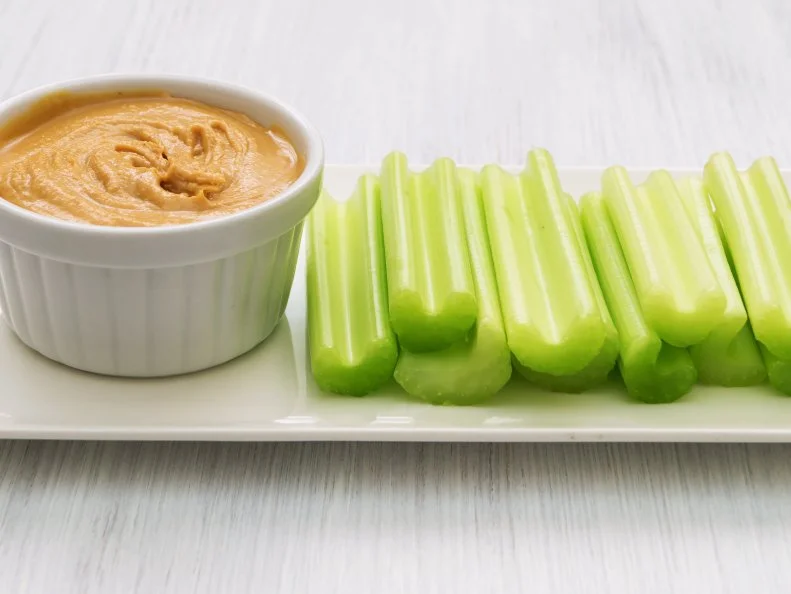 Celery sticks with peanut butter. Healthy snack