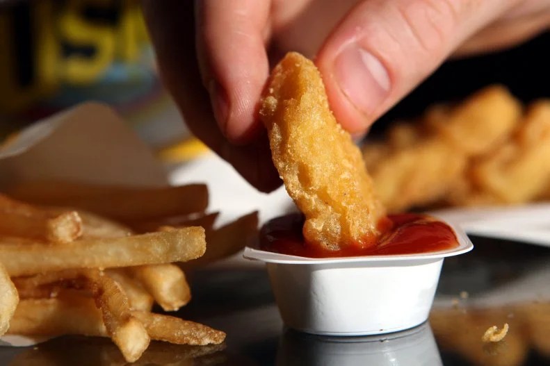 When McDonald's introduced the Buttermilk Crispy Chicken Tenders in October 2017, many people speculated that the good old-fashioned McNugget eventually would go the way of the dinosaur. However, according to a McDonald's spokesperson, the golden-crusted nuggets we all pined for as youngsters continue to shine as customers' favored meal, regardless of their age. Made with 100 percent white meat and no artificial preservatives, the nuggets have more in common with their healthier-seeming cousins than you might have imagined.