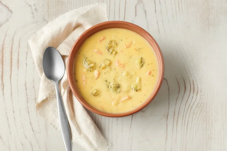 At Panera, the hands-down fan favorite is a no-brainer: Broccoli Cheddar Soup. The recipe features chopped broccoli and shredded carrots simmered in a velvety smooth cheese sauce with a top-secret blend of seasonings. The iconic soup is available in a cup, bowl or bread bowl. Let's face it — you want the bread bowl. We all want the bread bowl.