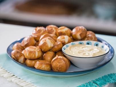 Food beauty of easy pizza dough pretzel bites with creamy mustard dippin’ sauce, as seen on Trisha’s Southern Kitchen, Season 12.