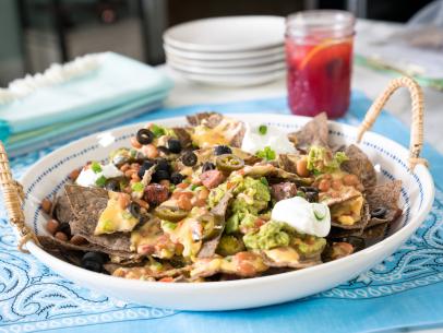 Food beauty of southern nacho with sausage and pimento cheese sauce, as seen on Trisha’s Southern Kitchen, Season 12.