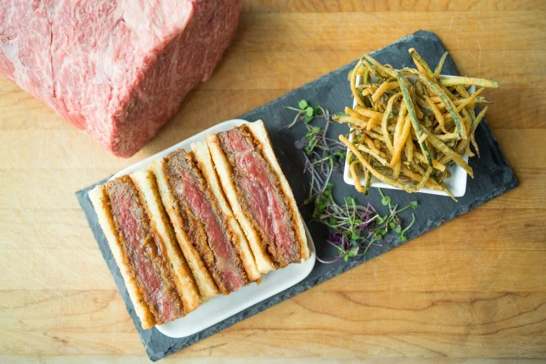 Japan exports some of the most-succulent beef in the universe. It's most often enjoyed in small portions, cooked quickly over binchotan charcoal and served in delicate rare bites, but the chefs at B&B Butchers have rewritten the wagyu cookbook by taking an A5 sirloin (the highest grade of marbling) and deep-frying it in panko crumbs, then serving it between two pieces of buttered and toasted white bread. The $120 price tag might just make it the most-expensive sandwich in the country.
