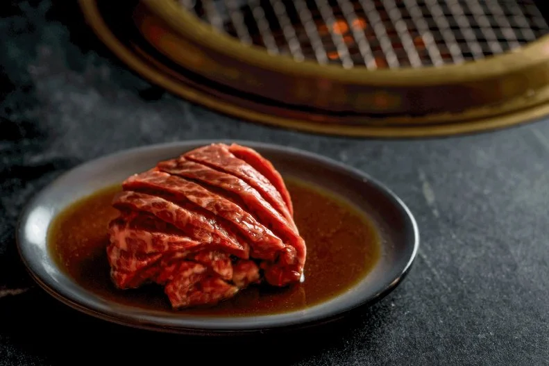 Diners love Korean barbecue because it gives them a rare opportunity to cook the meat themselves. With a grill in the middle of the table, servers typically deliver raw meat that sizzles as it becomes medium rare right before your eyes. Cote applies a steakhouse mentality to that concept, offering not just marinated galbi short rib, but beef certified as USDA Prime and American wagyu. For the best deal, order the $52-per-person feast.