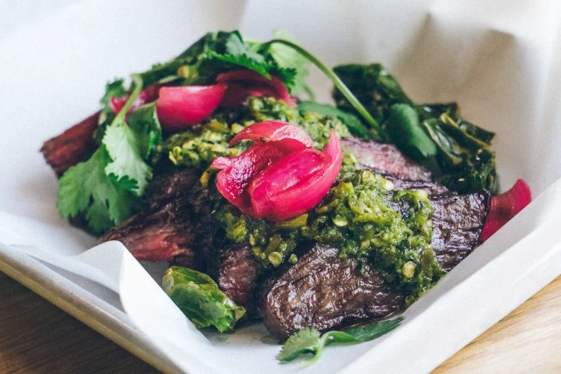 Loro is a dream collaboration between barbecue legend Aaron Franklin and beloved Texas sushi pioneer Tyson Cole. Their bavette steak starts off cold-smoked, then receives an extra burst of flavor courtesy of brisket fat that creates a sous vide effect and supercharges the steak with umami. Then it hits the grill, where it's cooked over charcoal made from post oak — perhaps the only traditional thing about this very special steak.